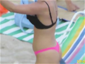 pinkish swimsuit first-timer sans bra hidden cam Beach women