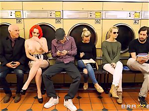 Flame haired Jasmine James gets stuffed in the launderette